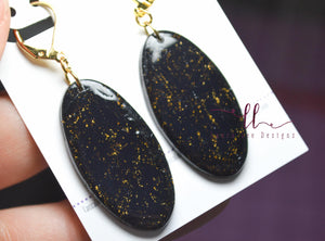 Small Jackie Oval Clay Earrings || Black and Gold Swirl
