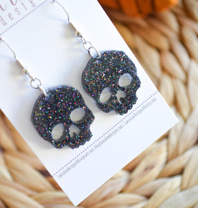 Small Skull Resin Earrings || Black Rainbow Glitter