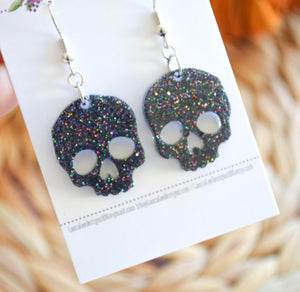 Small Skull Resin Earrings || Black Rainbow Glitter